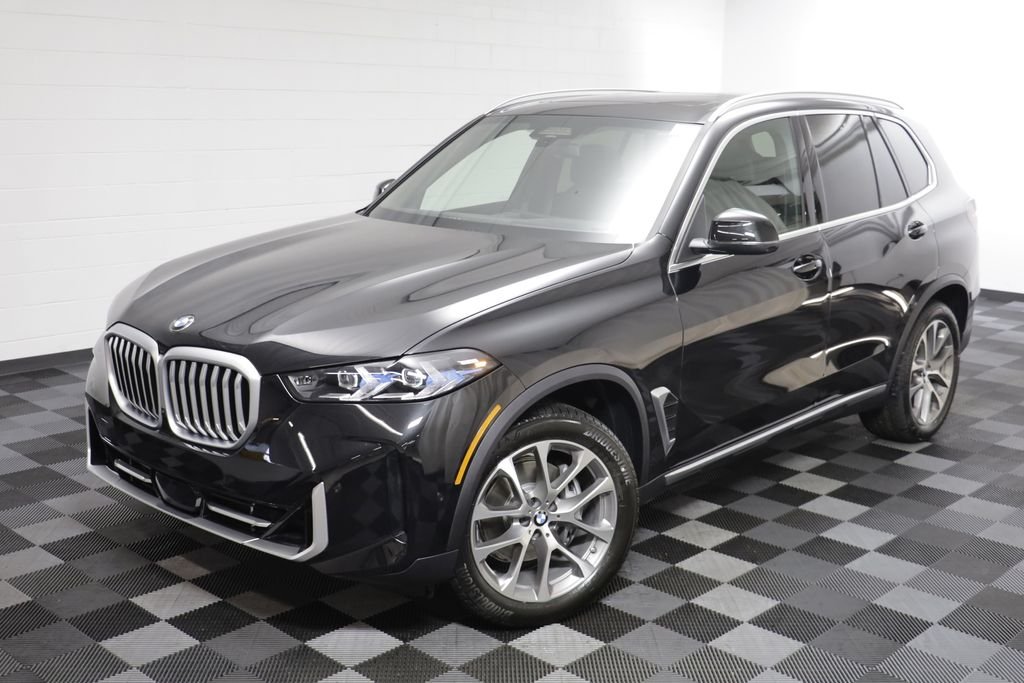 New 2026 Black Sapphire Metallic BMW xDrive40i image 2