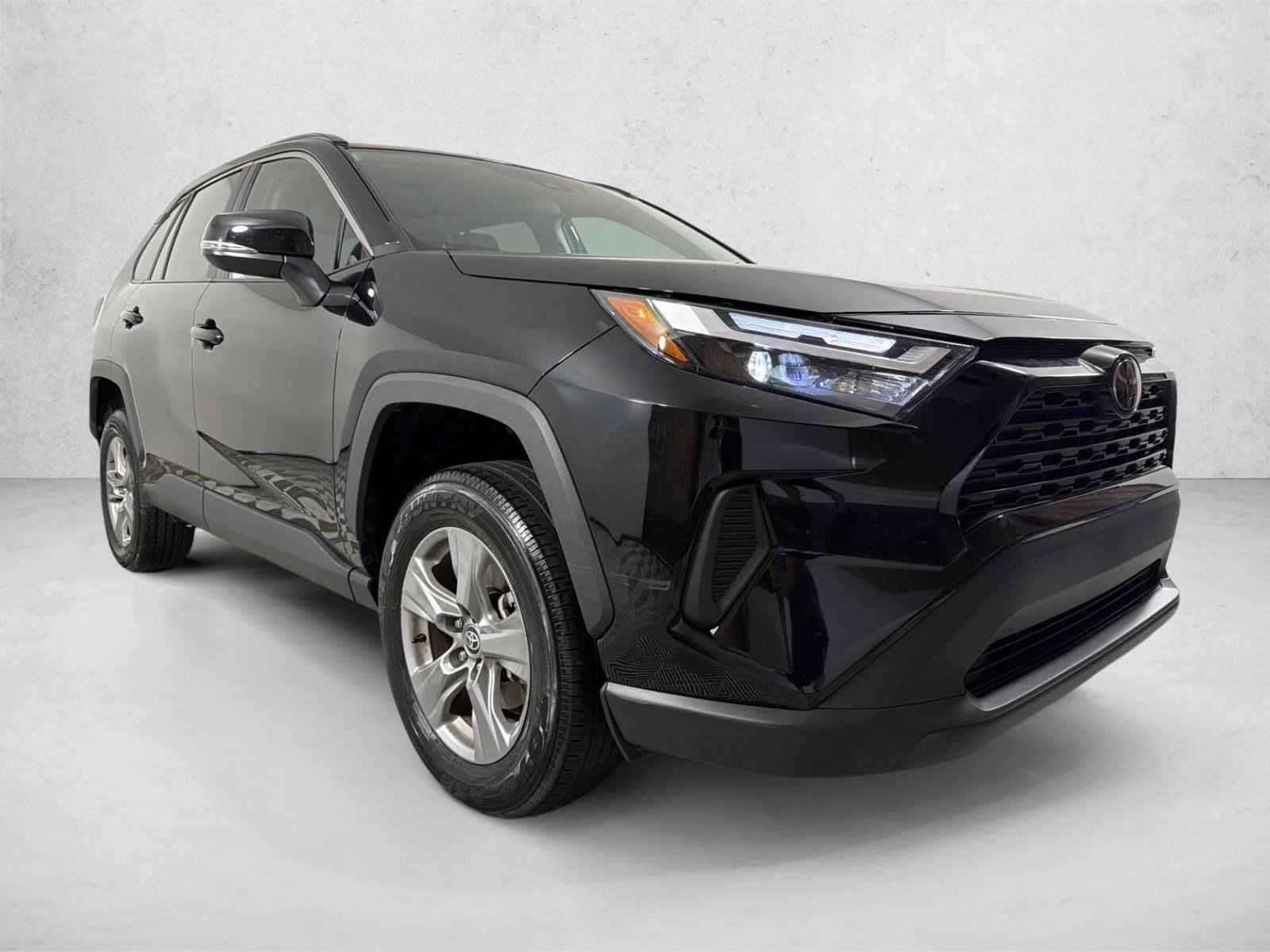 Used 2025 Midnight Black Metallic Toyota XLE image 1