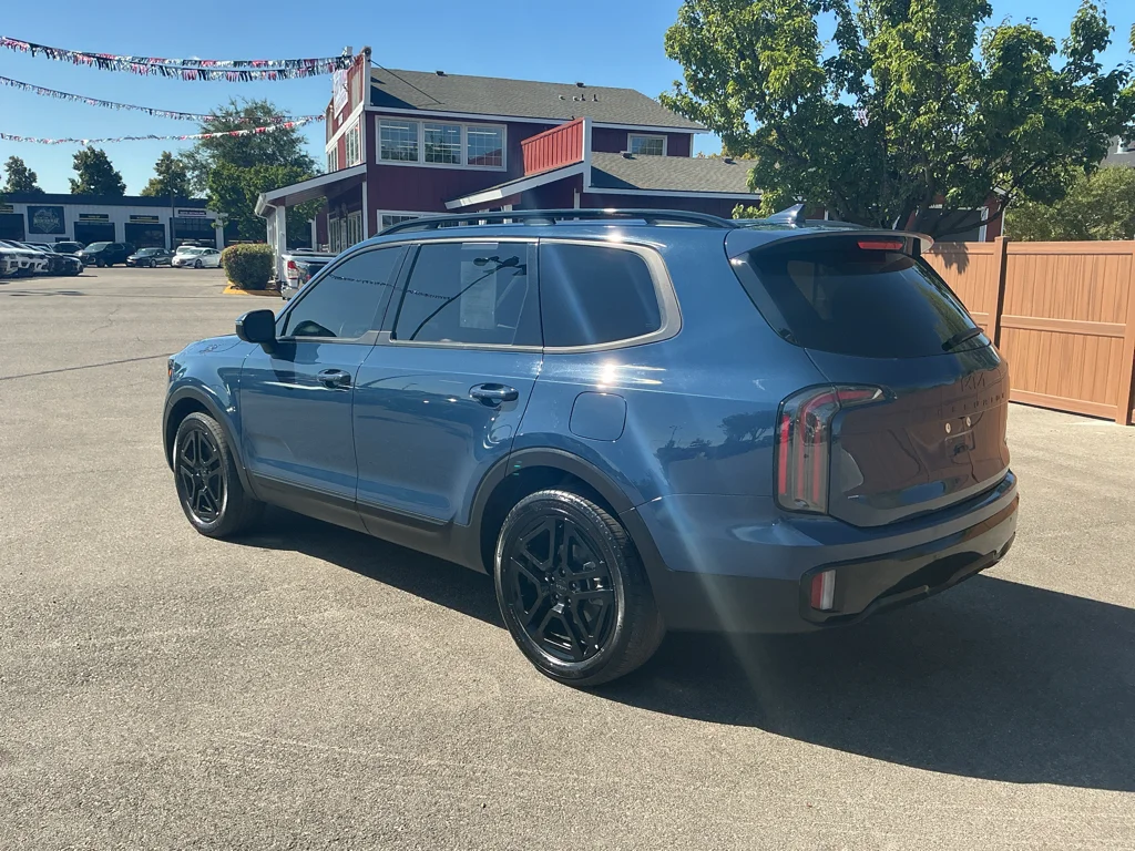 Used 2025 Midnight Lake Blue Kia EX X-Line image 7