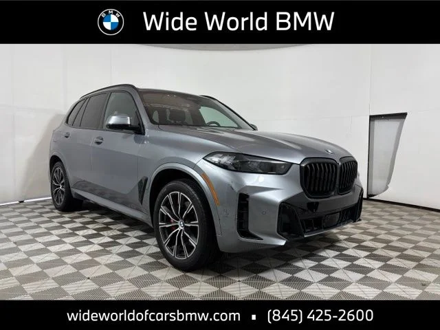 Used 2024 Skyscraper Grey Metallic BMW xDrive40i image 1