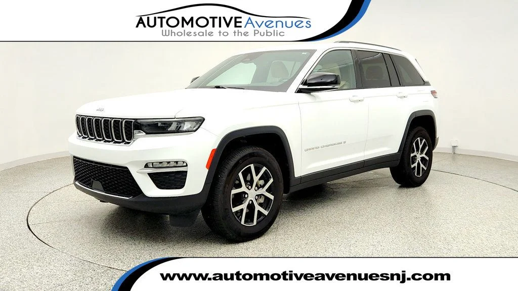 Used 2023 Bright White Clearcoat Jeep Limited 4x4 w/ 18