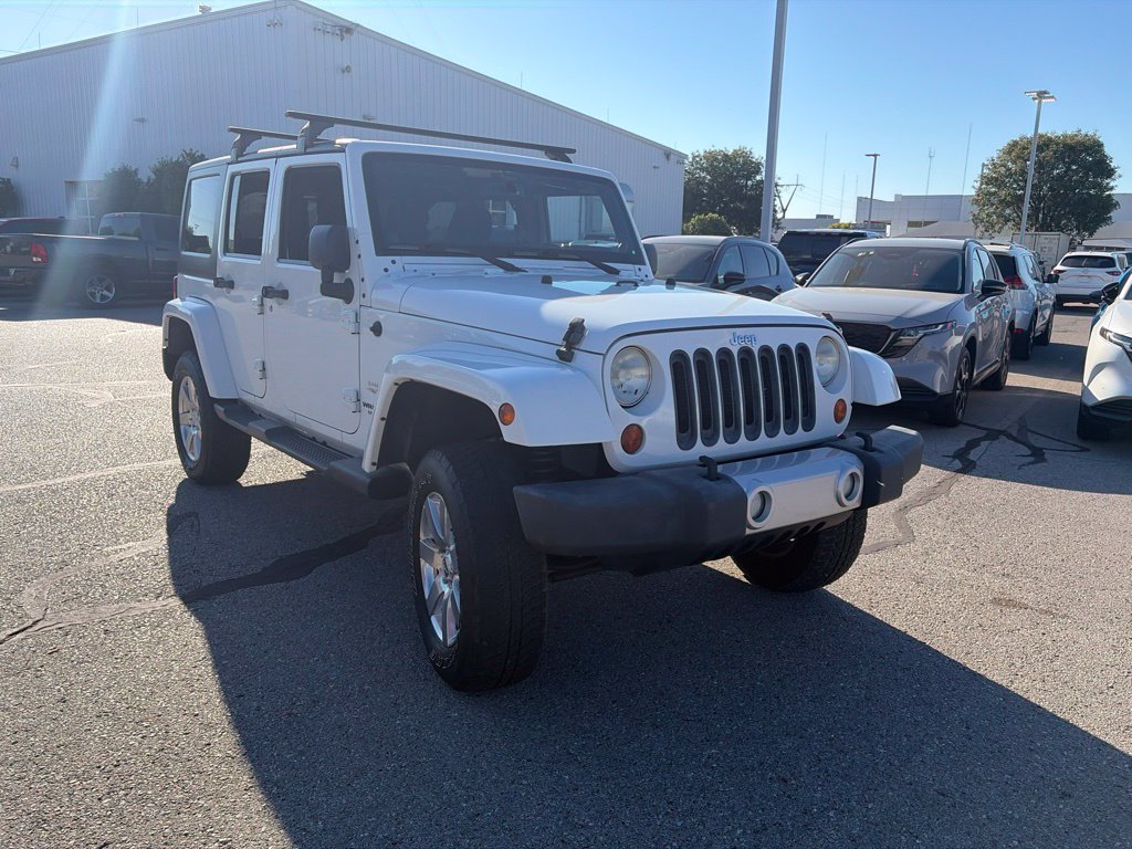 Used 2013 White Jeep Unlimited Sahara image 5