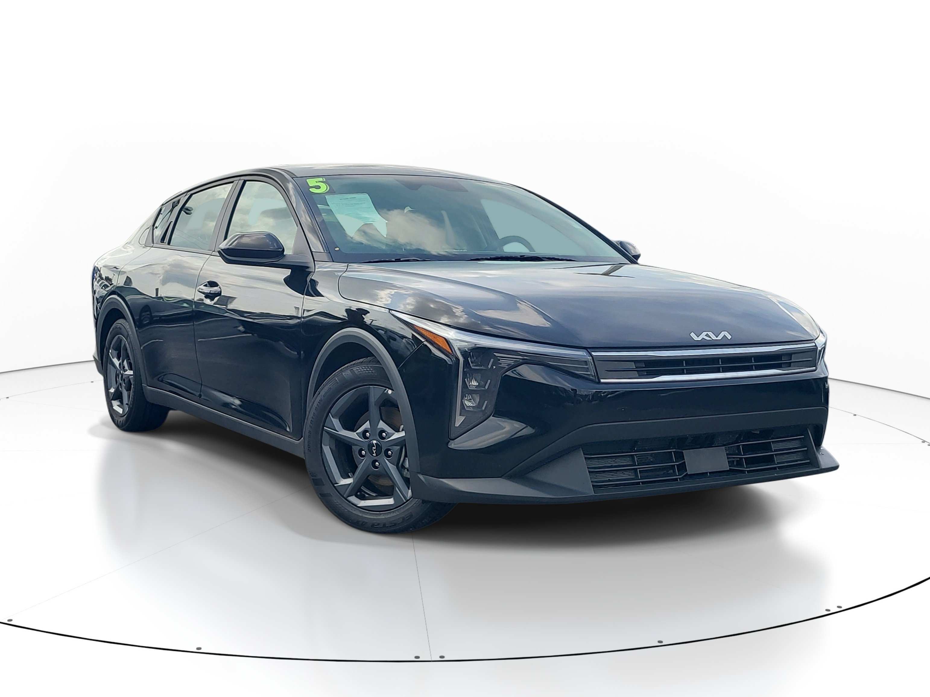Used 2025 Aurora Black Pearl Kia LXS image 1