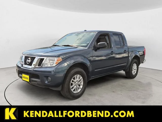 Used 2016 Arctic Blue Nissan SV image 1