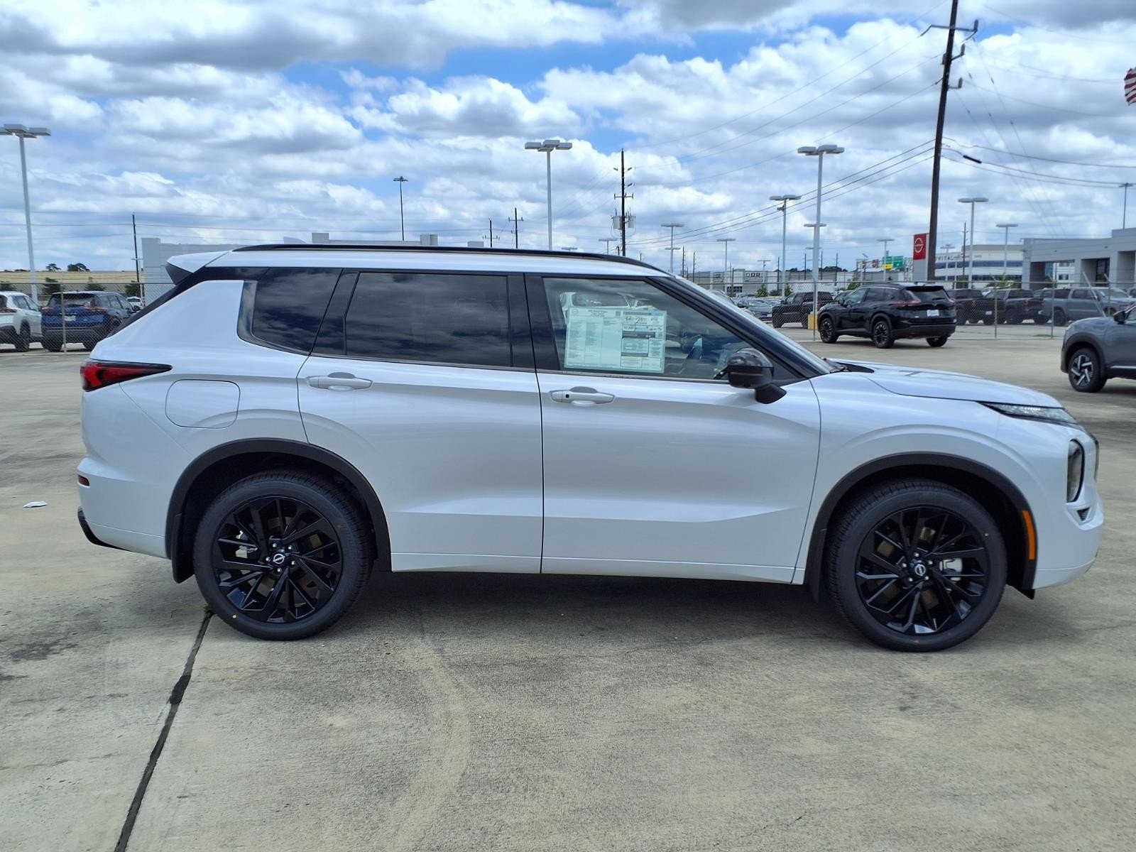 2026 Nissan Rogue Plug-In Hybrid Platinum White at Sterling McCall Nissan