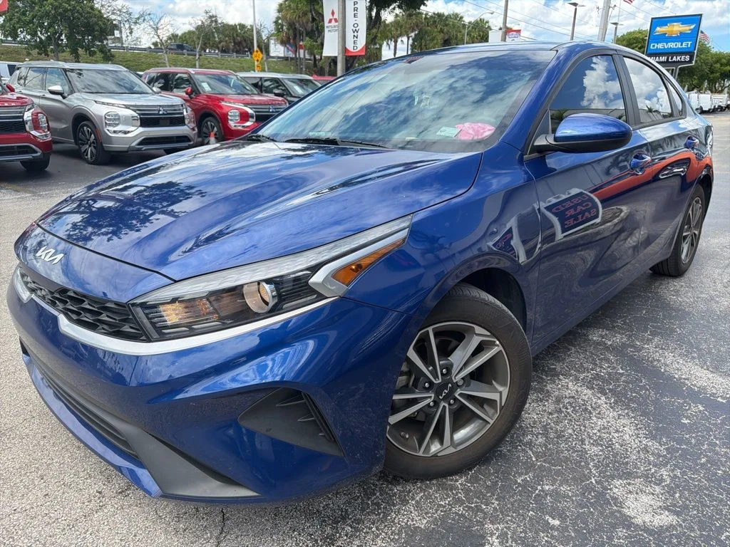 Used 2023 Deep Sea Blue Kia LXS image 1