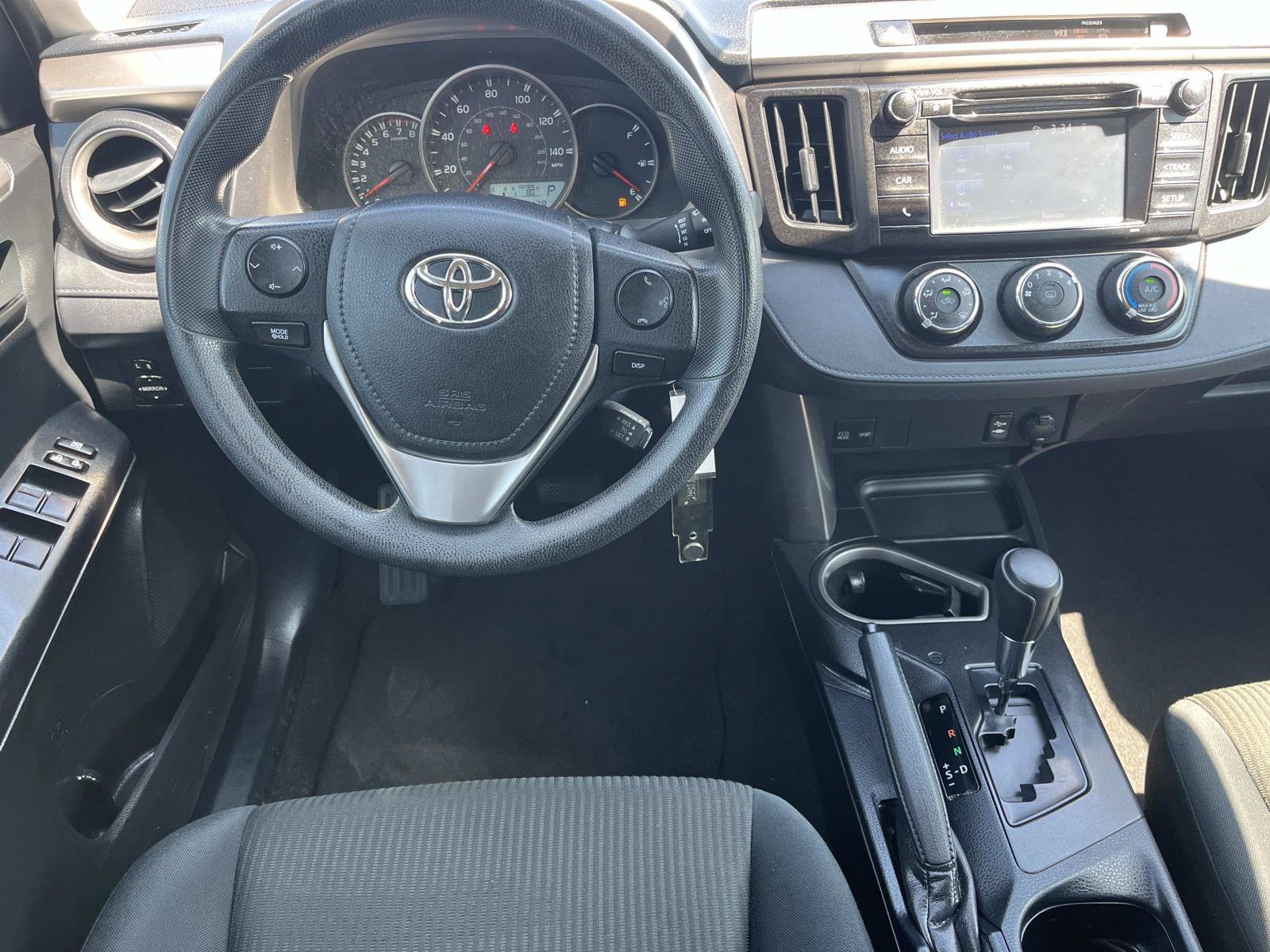 Used 2016 Magnetic Gray Metallic Toyota LE image 12