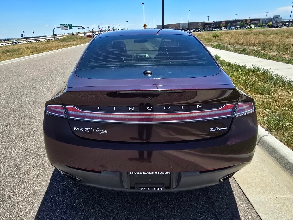Used 2013 Ruby Red Metallic Tinted Clearcoat Lincoln Base image 4
