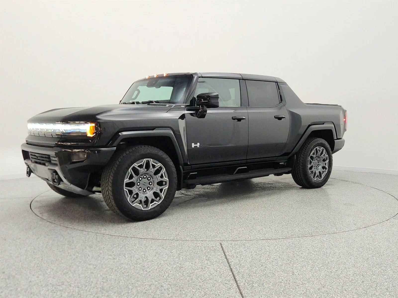 Used 2025 Void Black GMC e4WD Crew Cab 3X image 1