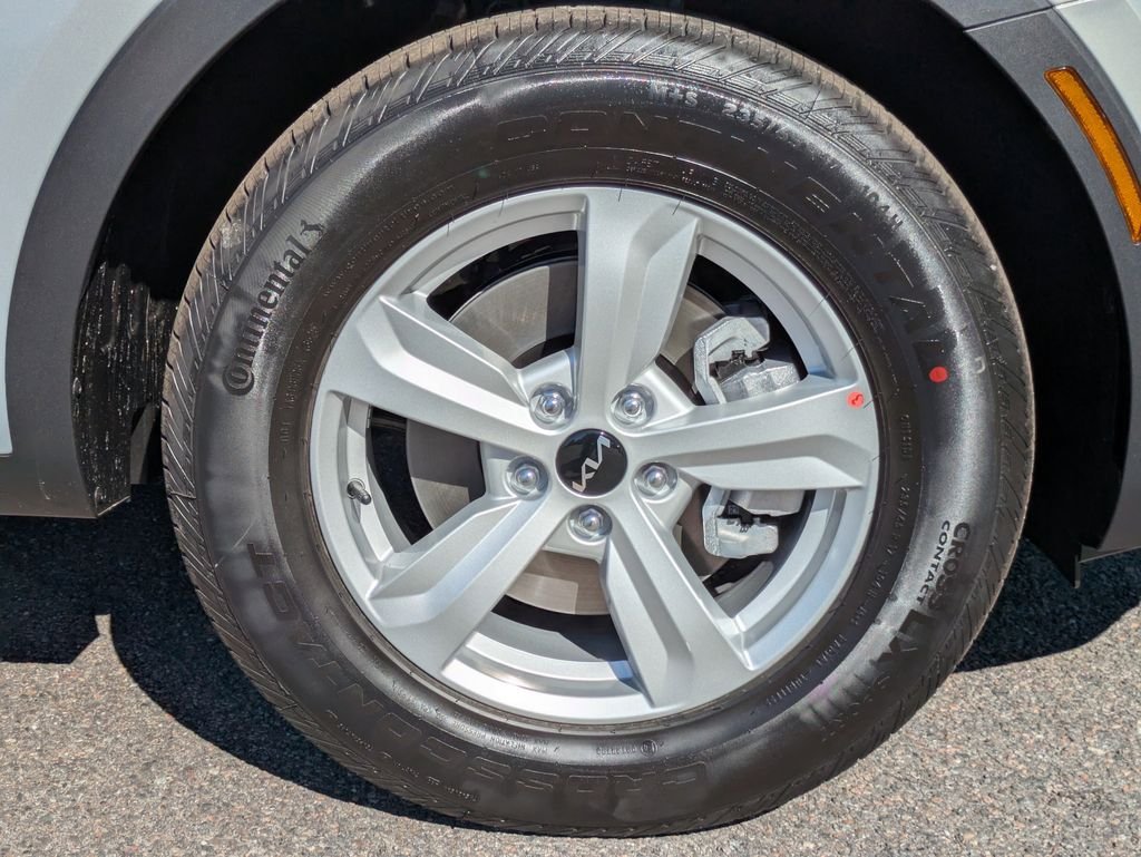 New 2026 Ivory Silver Kia LX image 10