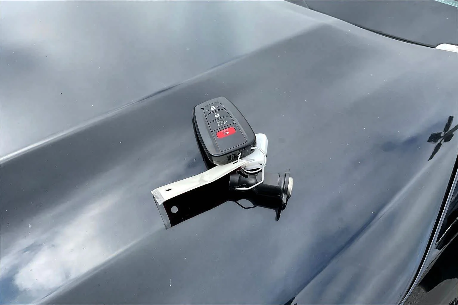 Used 2023 Midnight Black Metallic Toyota LE image 14