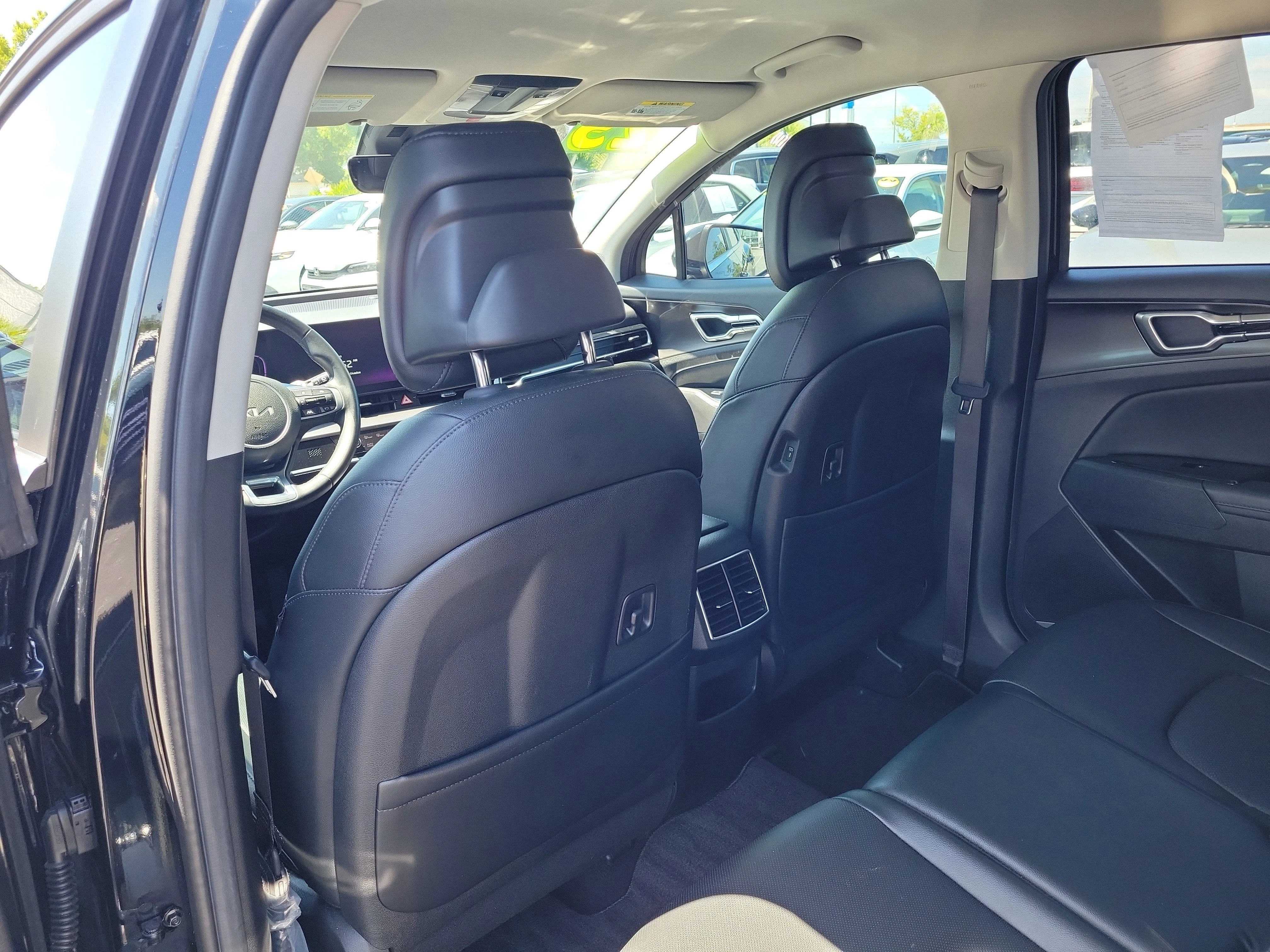 Used 2025 Ebony Black Kia EX image 13