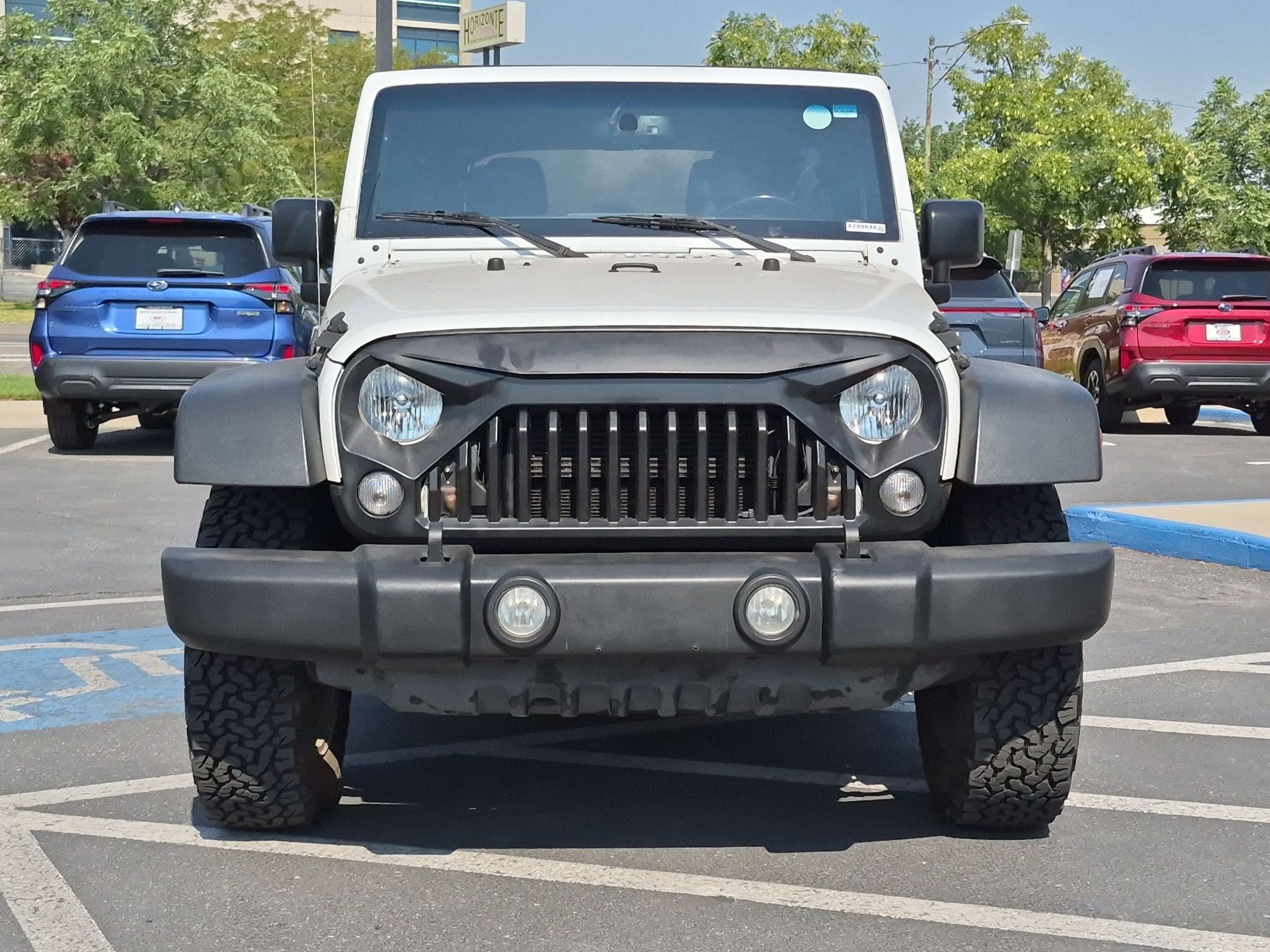 Used 2016 Bright White Clearcoat Jeep Rubicon image 9