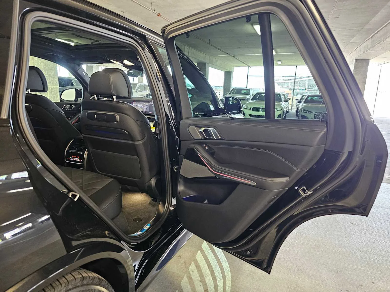 New 2026 Black Sapphire Metallic BMW xDrive50e image 38