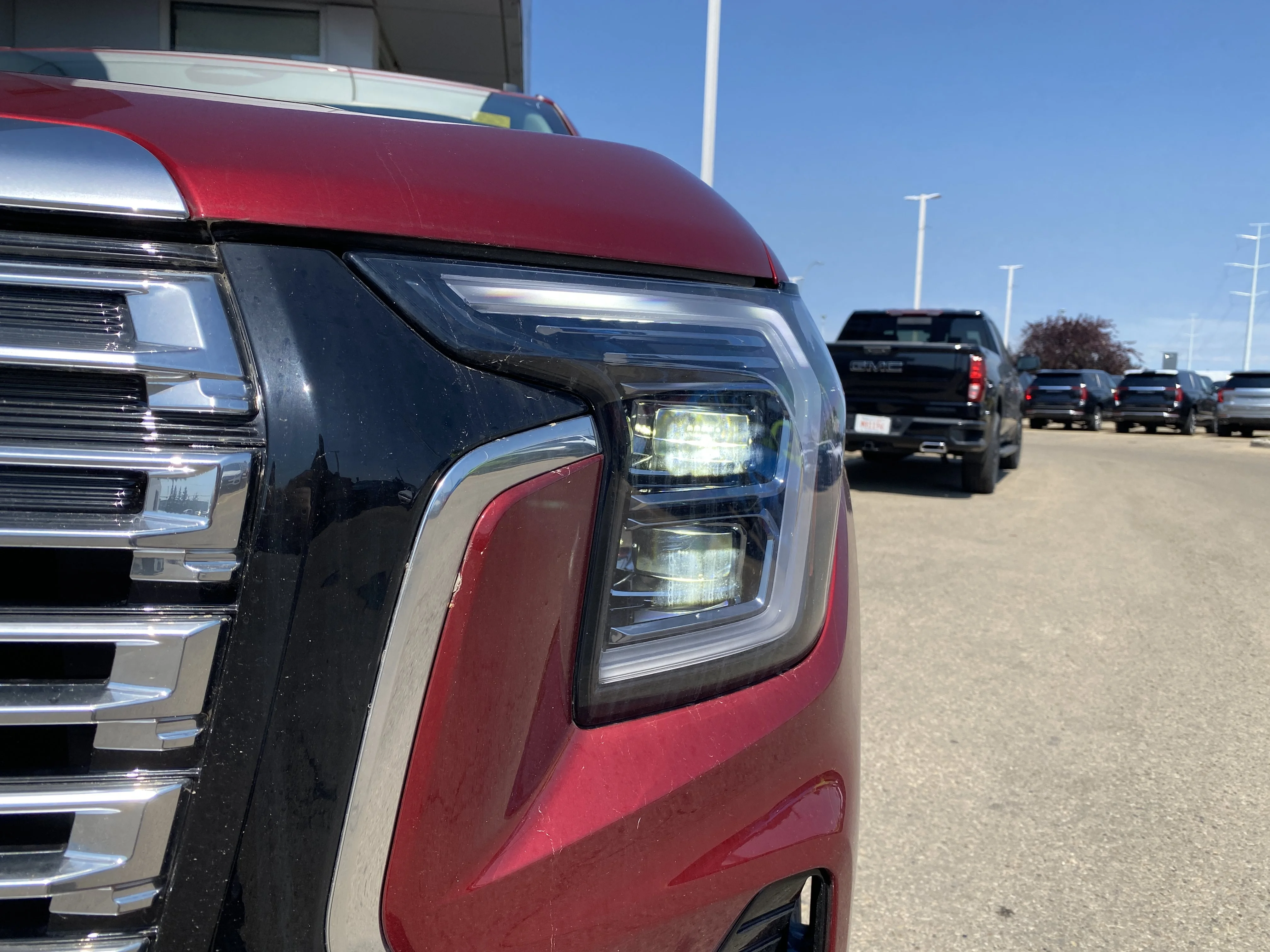 New 2026 VOLCANIC RED TINTCOAT GMC AWD Denali image 10
