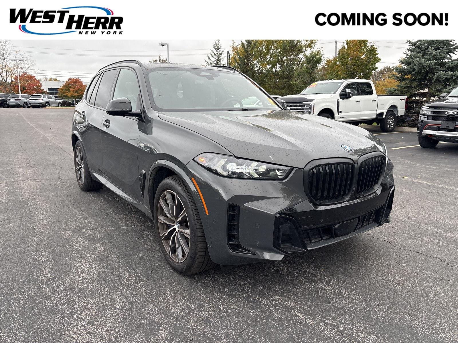 Used 2025 Dravit Grey Metallic BMW xDrive50e image 1