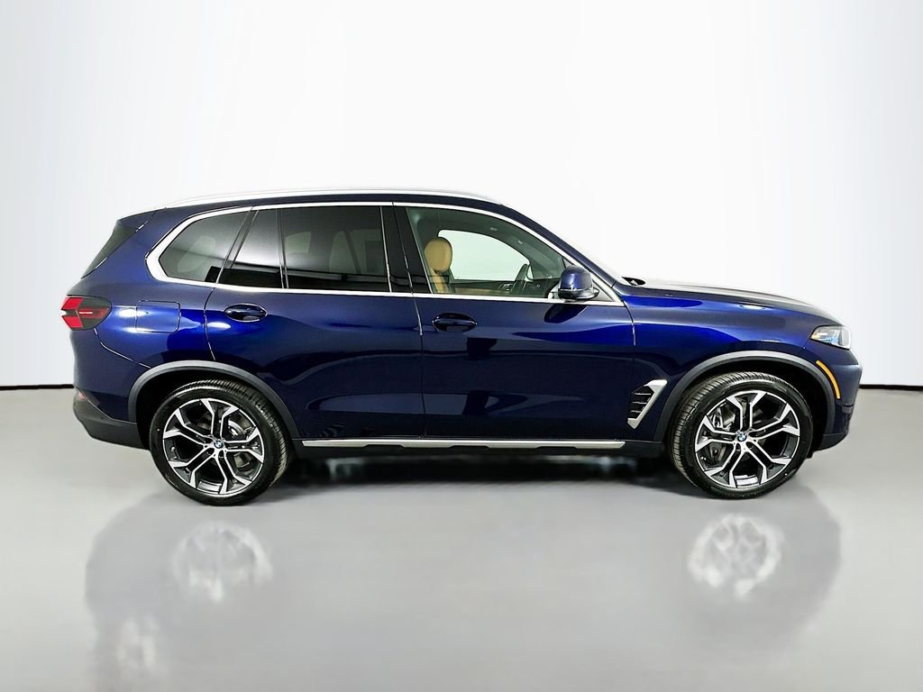 New 2026 Tanzanite Blue II Metallic BMW xDrive50e image 4