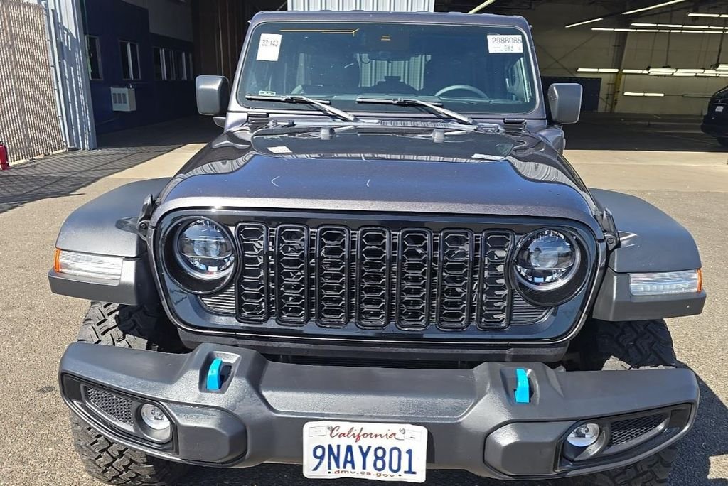 Used 2024 Jeep Wrangler 4xe Willys 4XE with VIN 1C4RJXN62RW310574 for sale in Kansas City