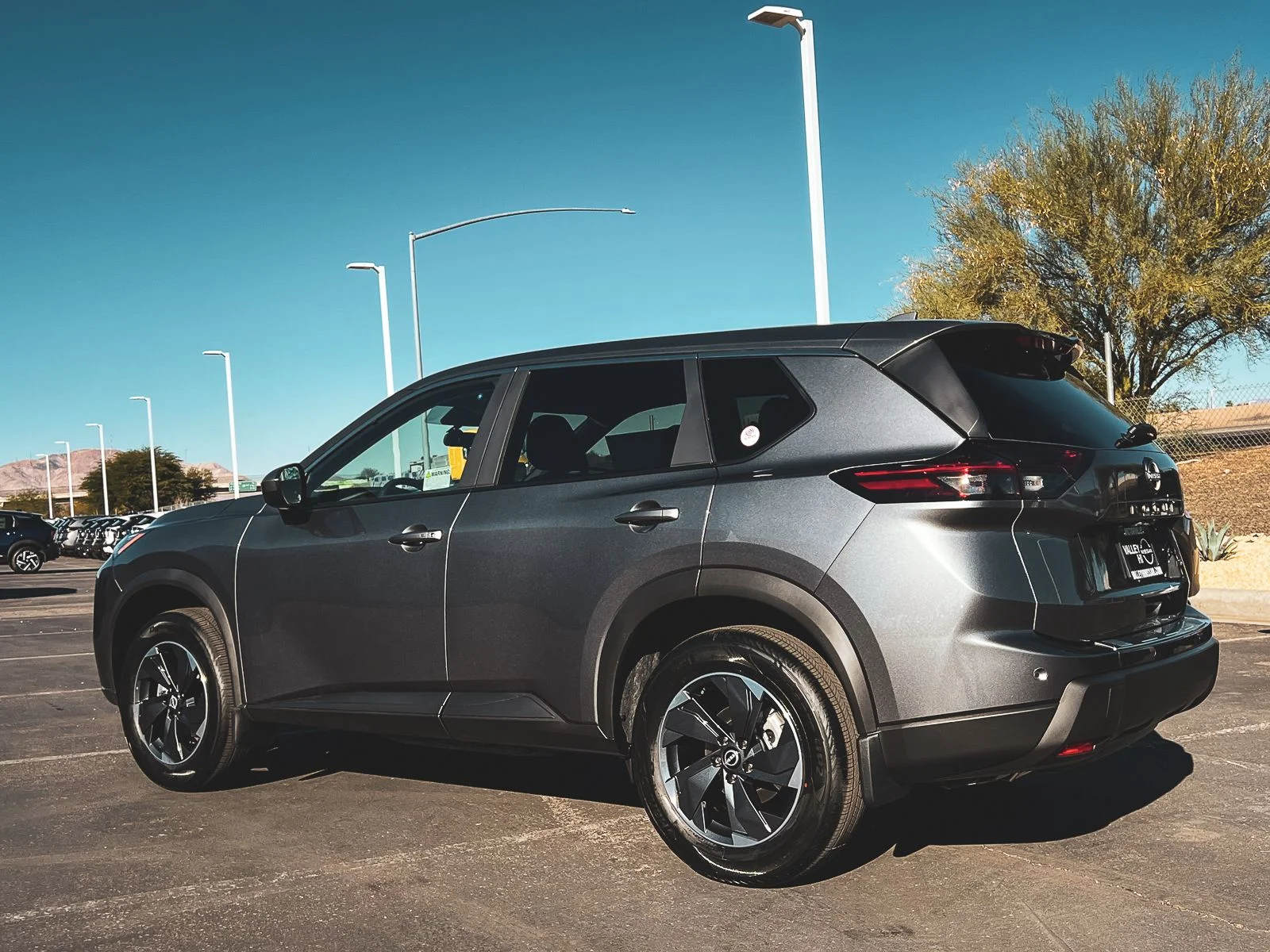 New 2026 Gun Metallic Nissan SV image 7