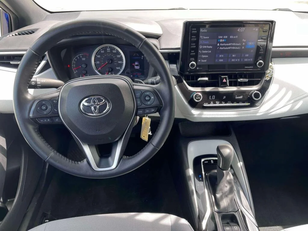 Certified Used 2022 Blue Crush Metallic Toyota SE image 2