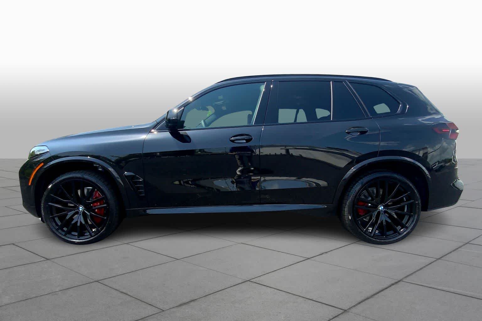 New 2026 Black Sapphire Metallic BMW sDrive40i image 13