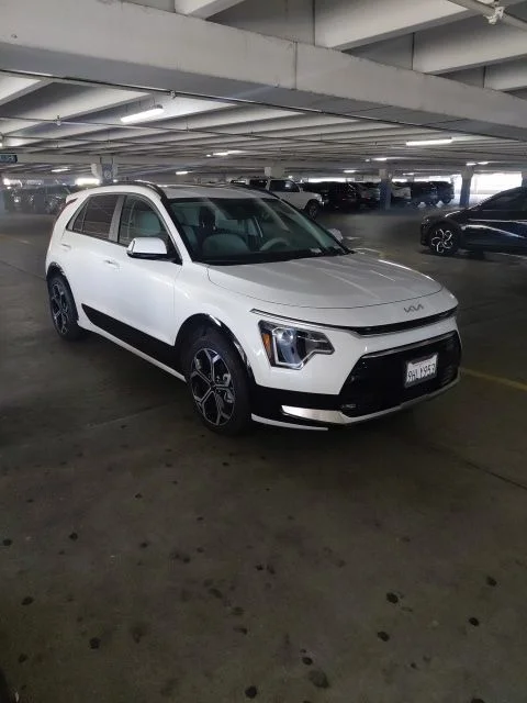 Certified Used 2023 White Kia EX Touring image 2