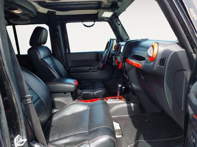 Used 2012 Black Jeep Unlimited Sahara Altitude image 9