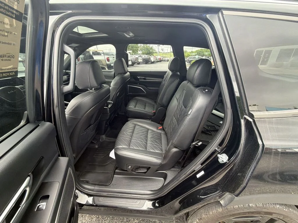 Used 2024 Black Kia EX X-Line image 23