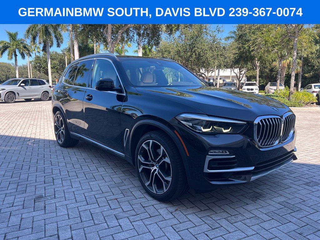 Used 2021 Black Sapphire Metallic BMW sDrive40i image 4