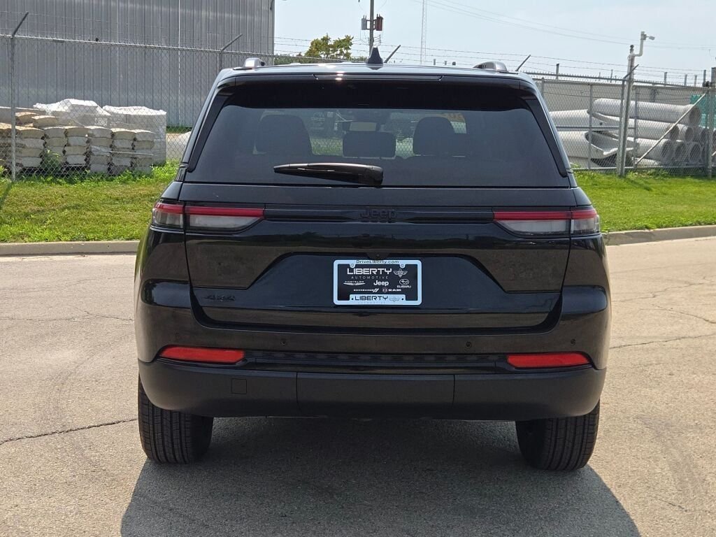 Certified Used 2024 Black Jeep Altitude image 11
