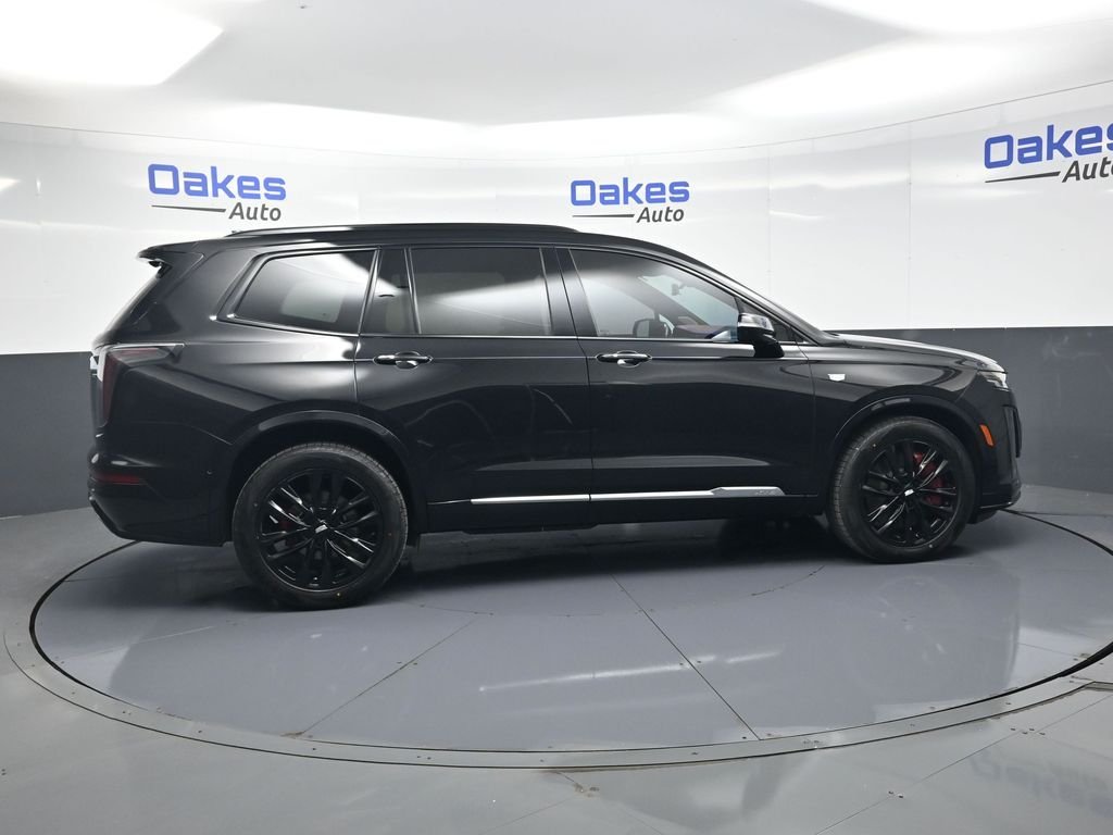 Used 2023 Stellar Black Metallic Cadillac Sport image 8
