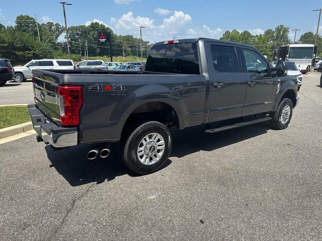 Used 2019 Magnetic Metallic Ford XLT 4WD Crew Cab 6.75 Box image 4