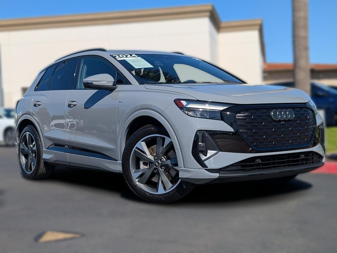 Certified Used 2024 Pebble Gray Audi Premium Plus 55 quattro image 1