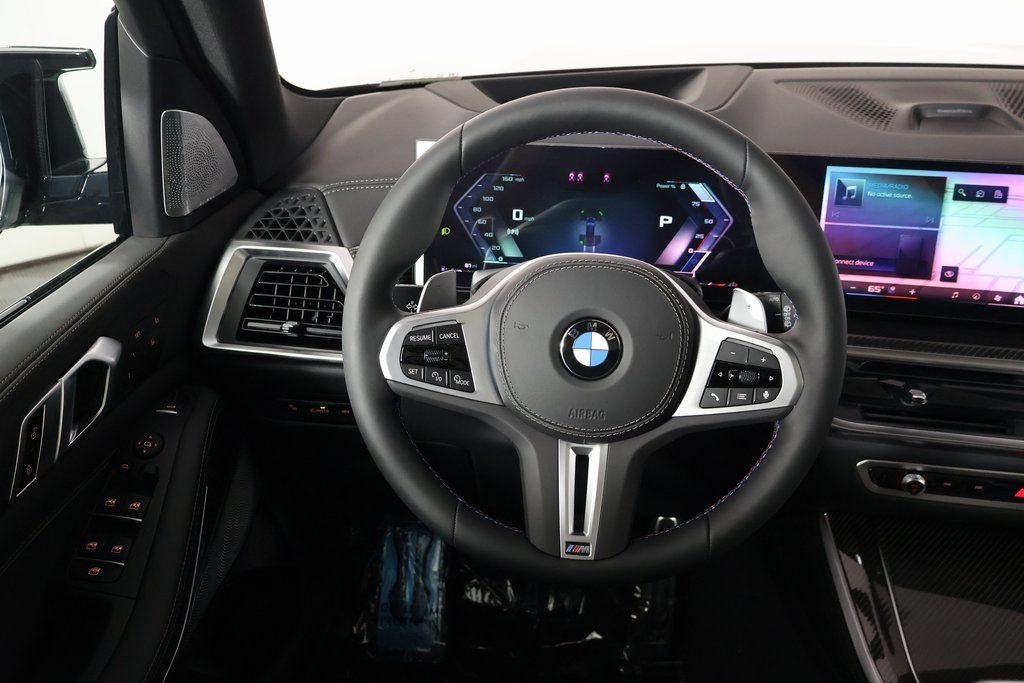 New 2026 Black Sapphire Metallic BMW M60i image 3