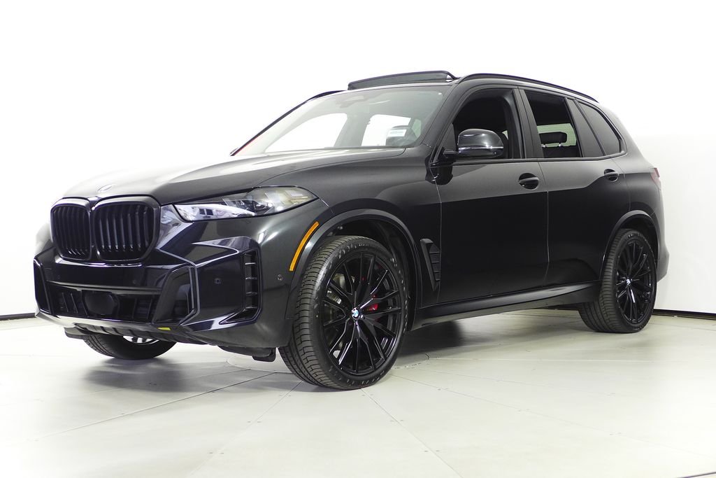 Used 2024 Black Sapphire Metallic BMW sDrive40i image 2