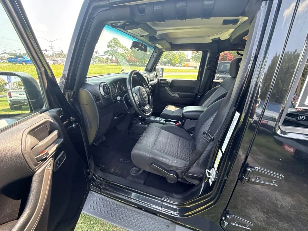 Used 2012 Black Jeep Unlimited Sport image 12