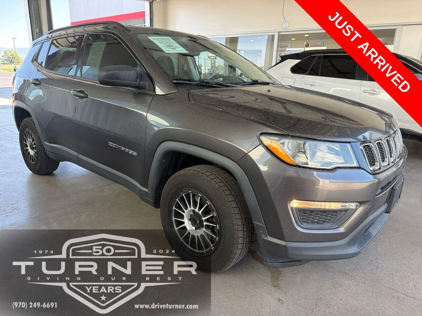 Used 2018 Gray Jeep Sport image 1