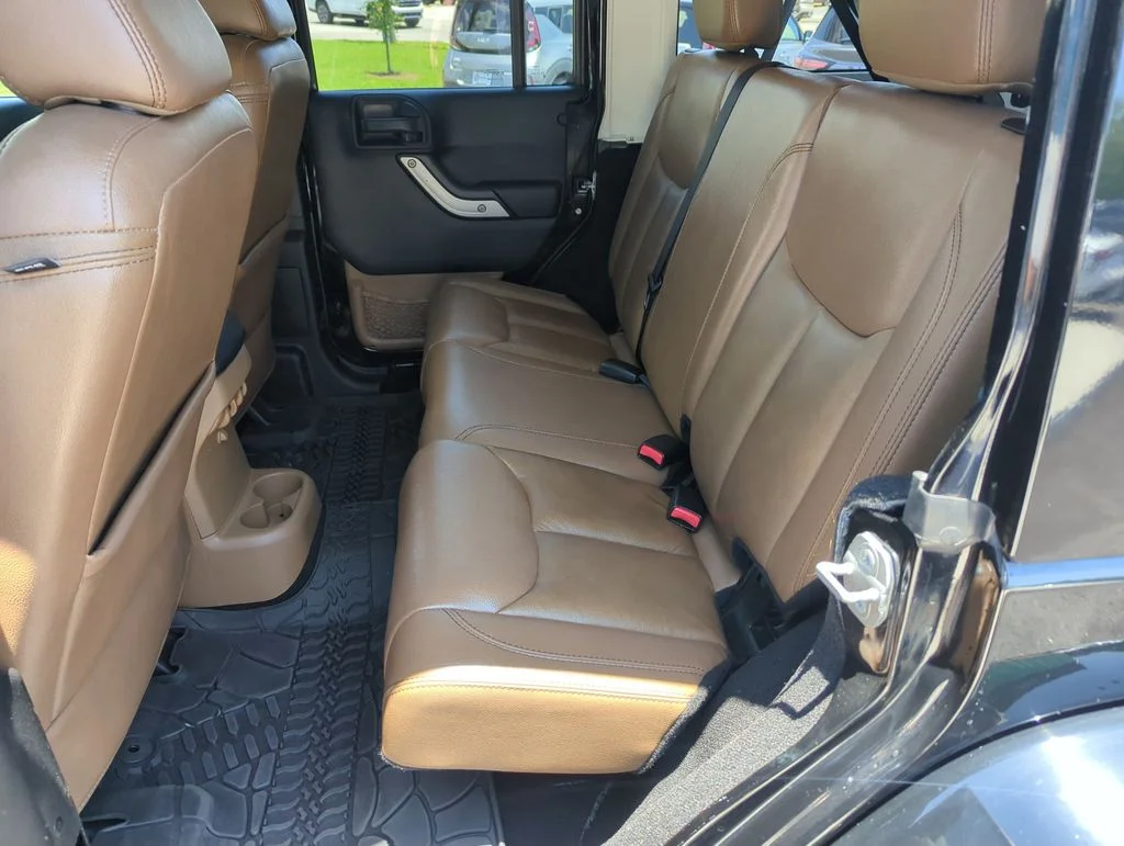 Used 2014 Black Jeep Unlimited Sahara image 26