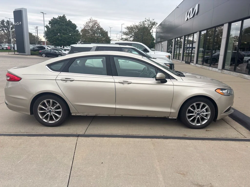 Used 2017 Gold Ford SE image 4