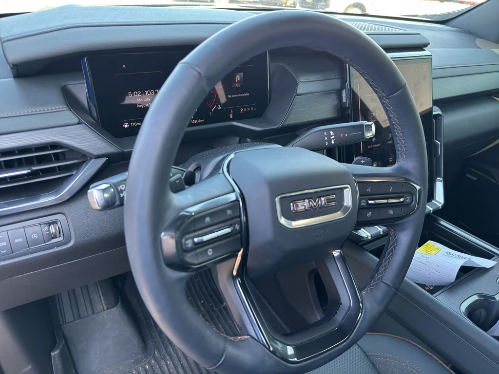 Used 2024 Ebony Twilight Metallic GMC AWD AT4 image 14