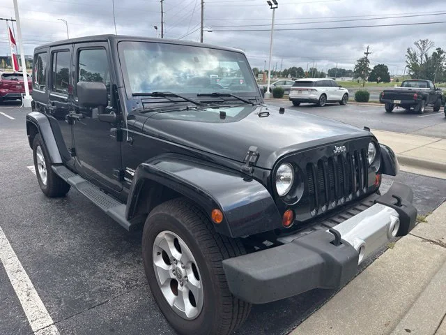 Used 2013 Black Jeep Unlimited Sahara image 5