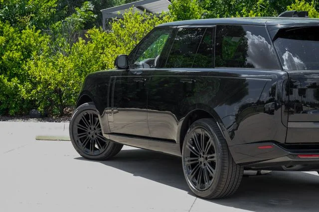 New 2026 Black Land Rover SE image 14