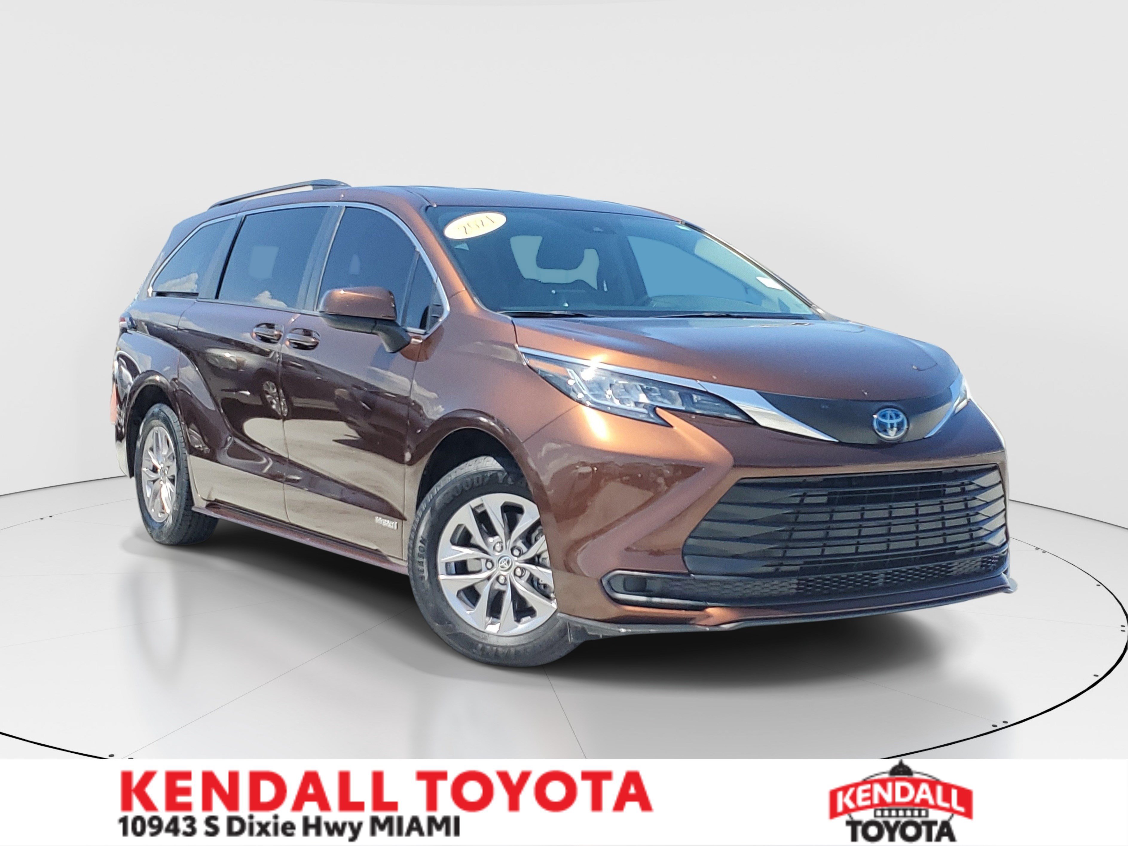 Used 2021 Sunset Bronze Toyota LE image 1