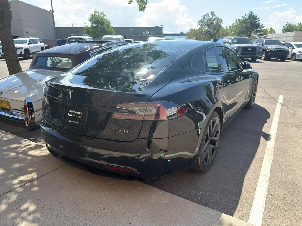 Used 2022 Solid Black Tesla Plaid image 5