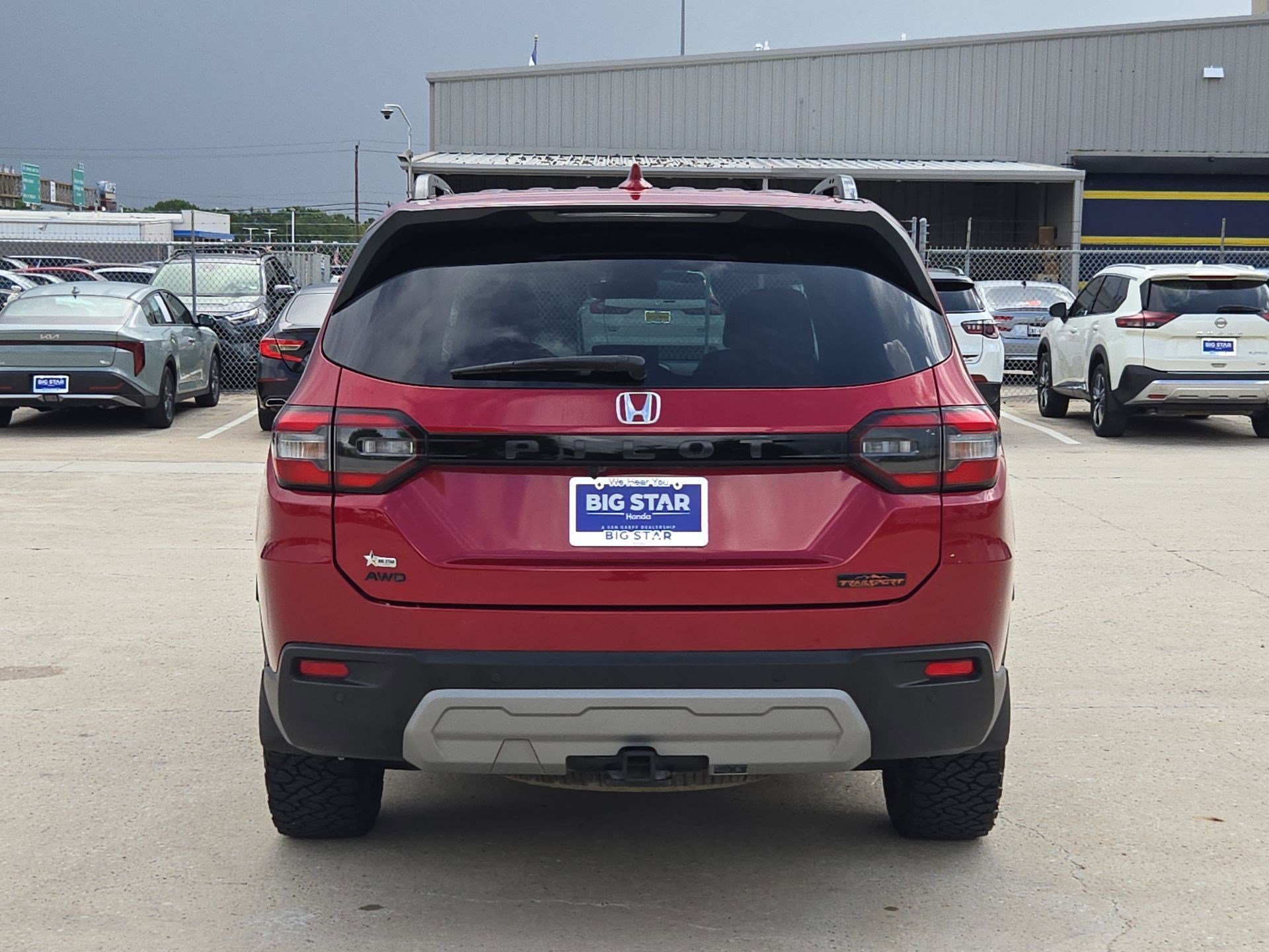 Certified Used 2024 Radiant Red Metallic II Honda AWD TRAILSPORT image 4