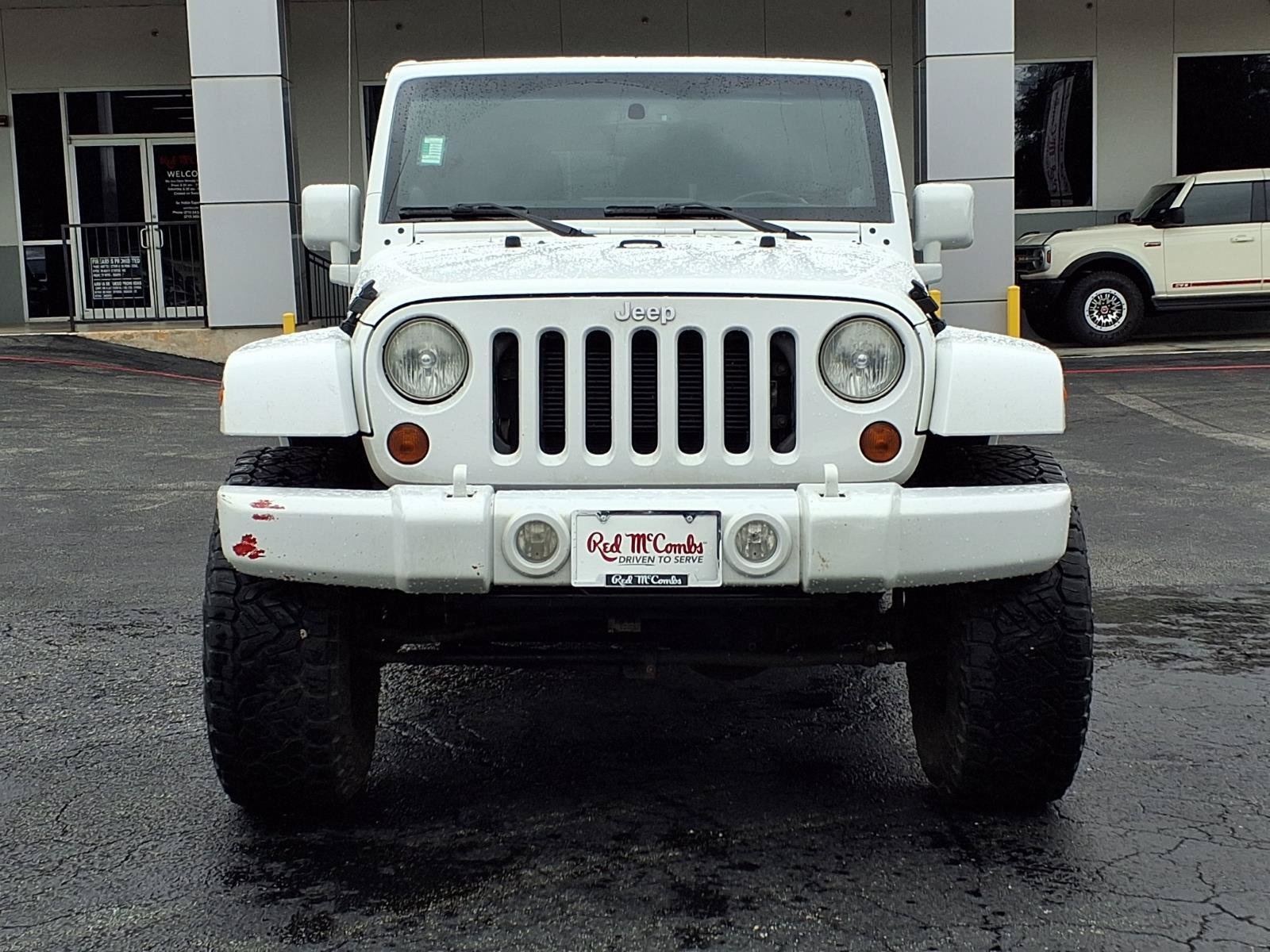 Used 2013 Bright White Jeep Sahara image 2
