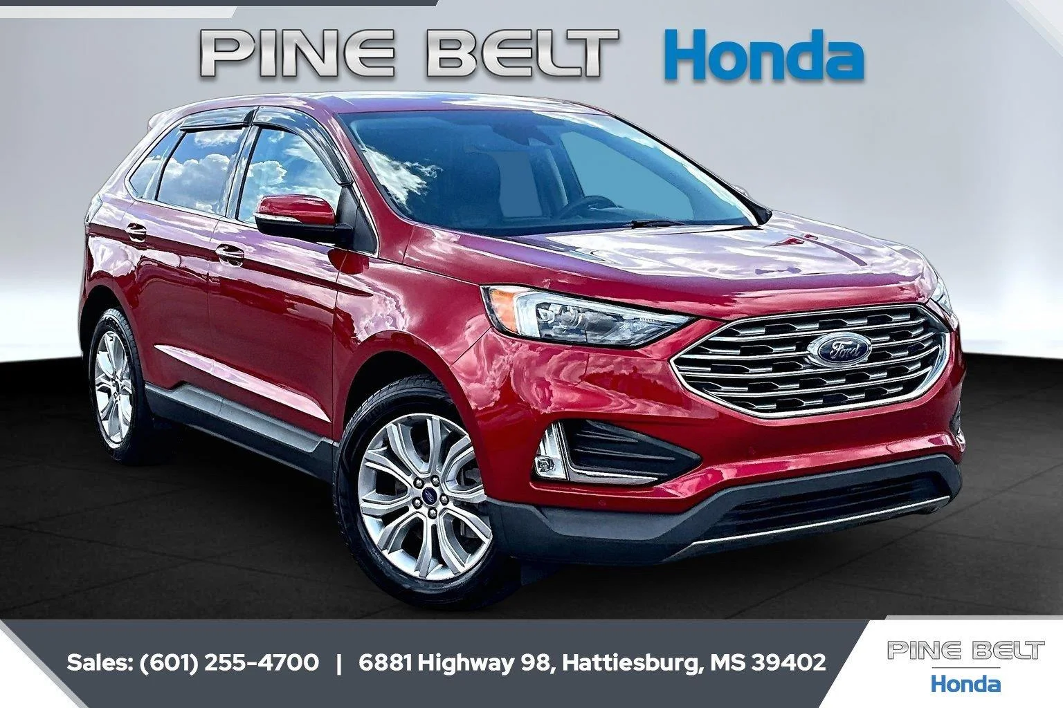 Used 2022 Rapid Red Metallic Tinted Clearcoat Ford Titanium image 1