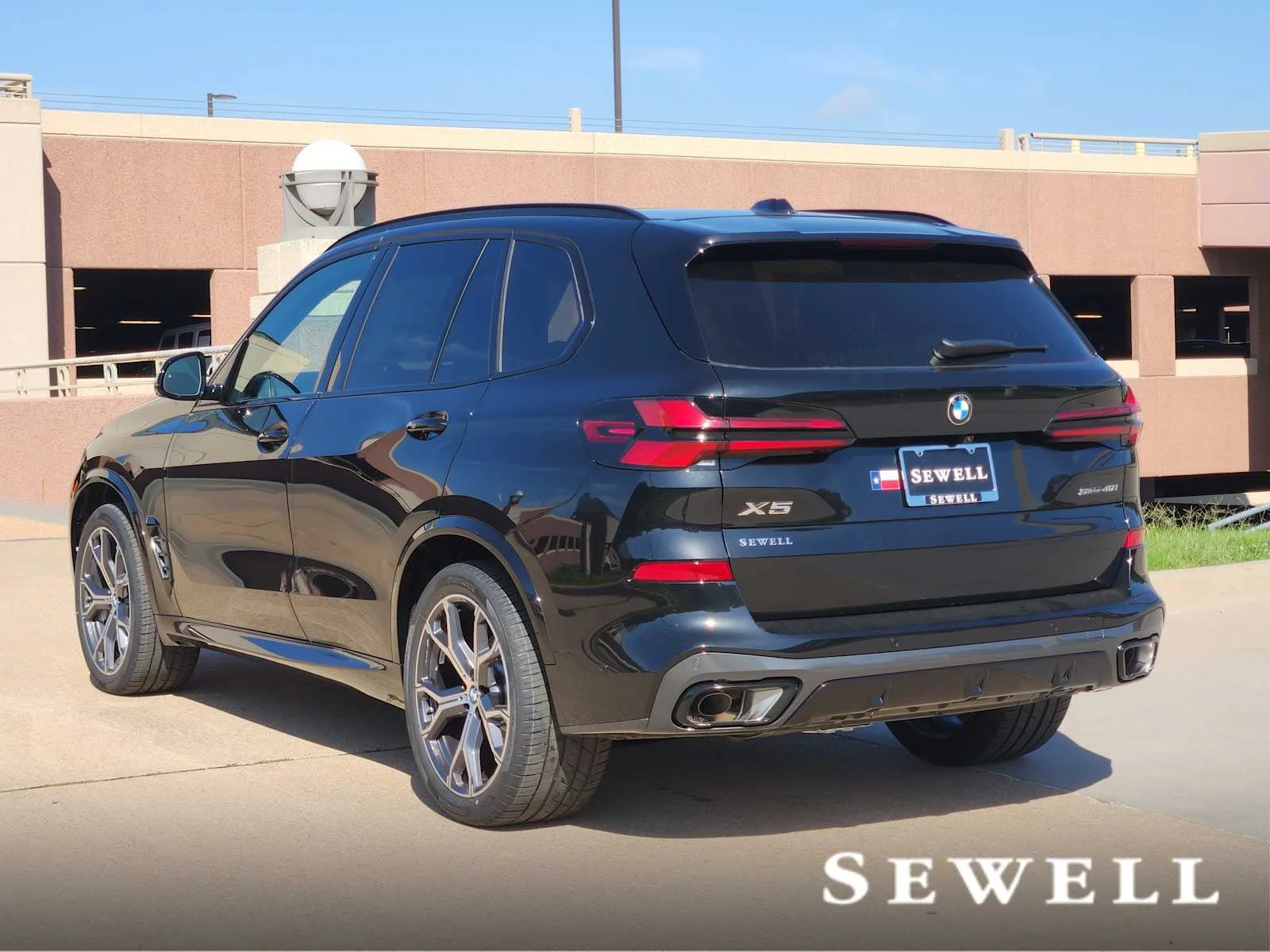 New 2026 Black Sapphire Metallic BMW sDrive40i image 3