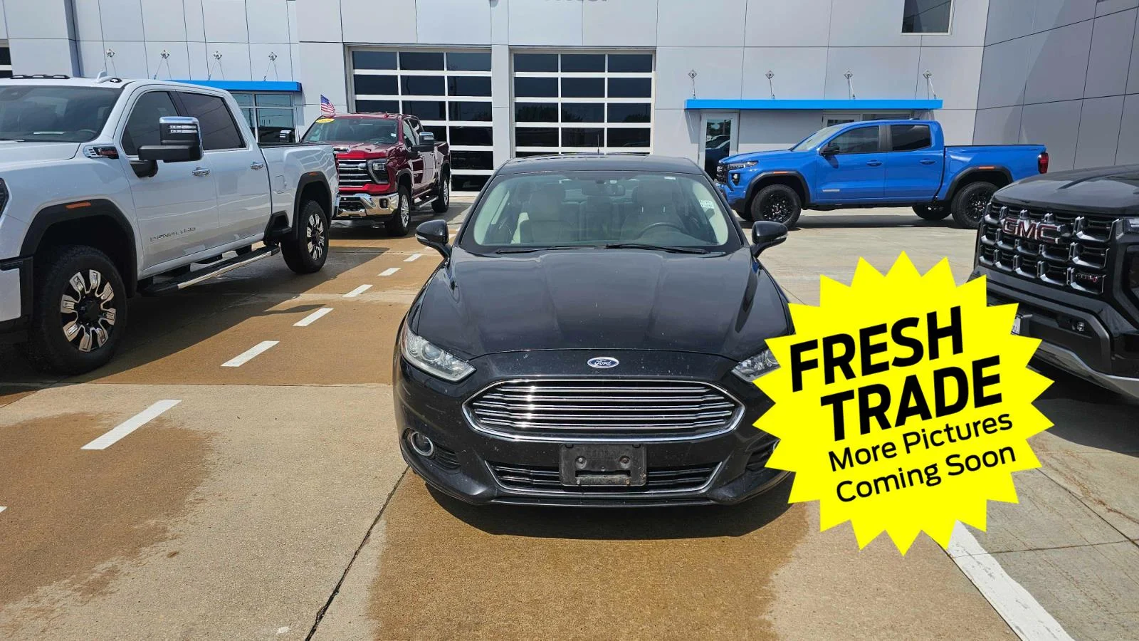 Used 2014 Ford Fusion Titanium with VIN 3FA6P0D93ER245435 for sale in Charles City, IA