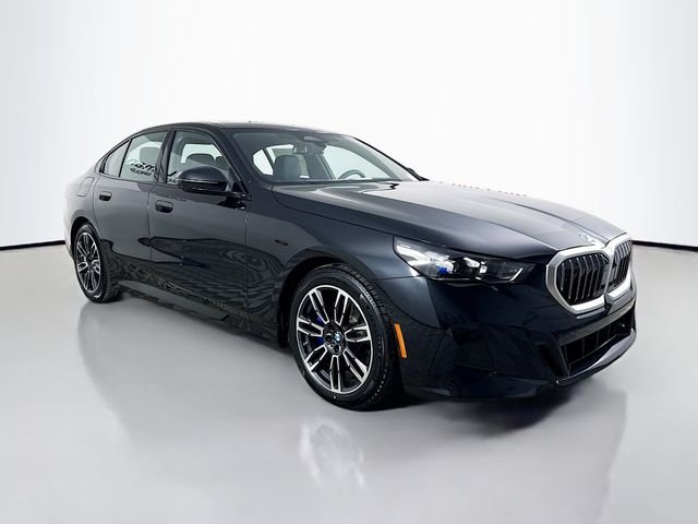 Used 2026 Black Sapphire Metallic BMW 530i xDrive image 1